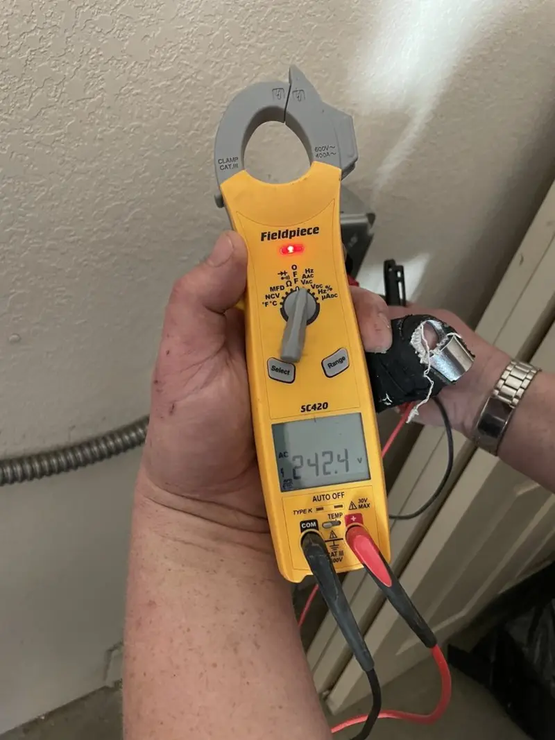 Voltage testing with clamp meter during Circuit Breaker Repair in Oak Harbor
